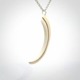 Hand carved incredible Huia bird beak bone carving. A stunning work of art, beautifully replicating a hula bird beak. This pendant was hand carved in bone by artist Sami. A one off collectors item that has been hand crafted to be worn or displayed.